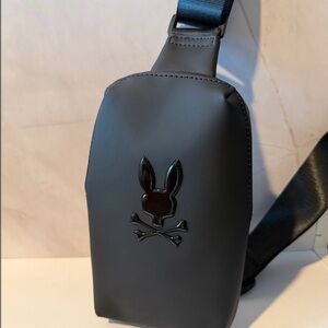 Psycho Bunny rubberized crossbody bag